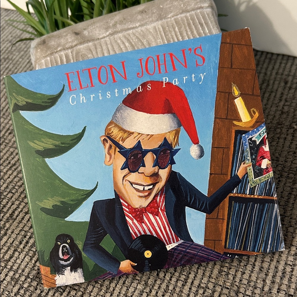 Elton John's Christmas Party CD trifold style with 21 songs various artists 2006